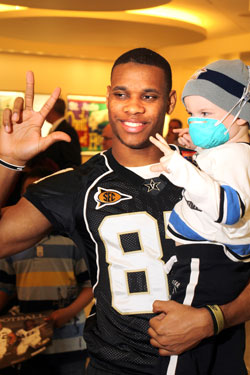 Matthews with St. Jude patient