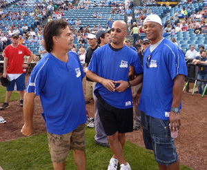 Celebrity softball outing scores charitable funds