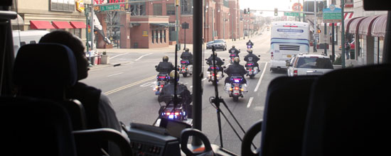 police escort of football team at 2011 liberty bowl